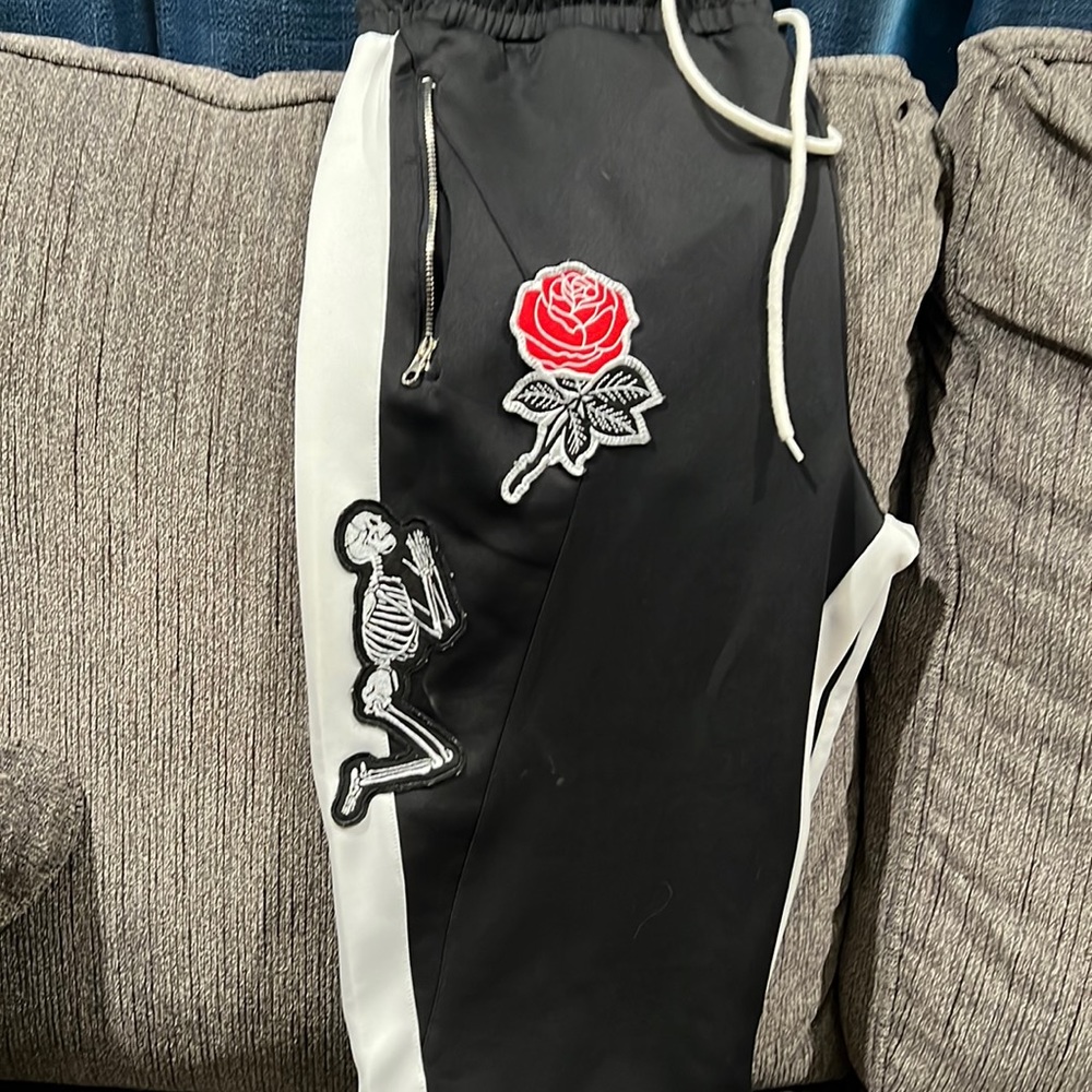 Black and white striped reasons pants